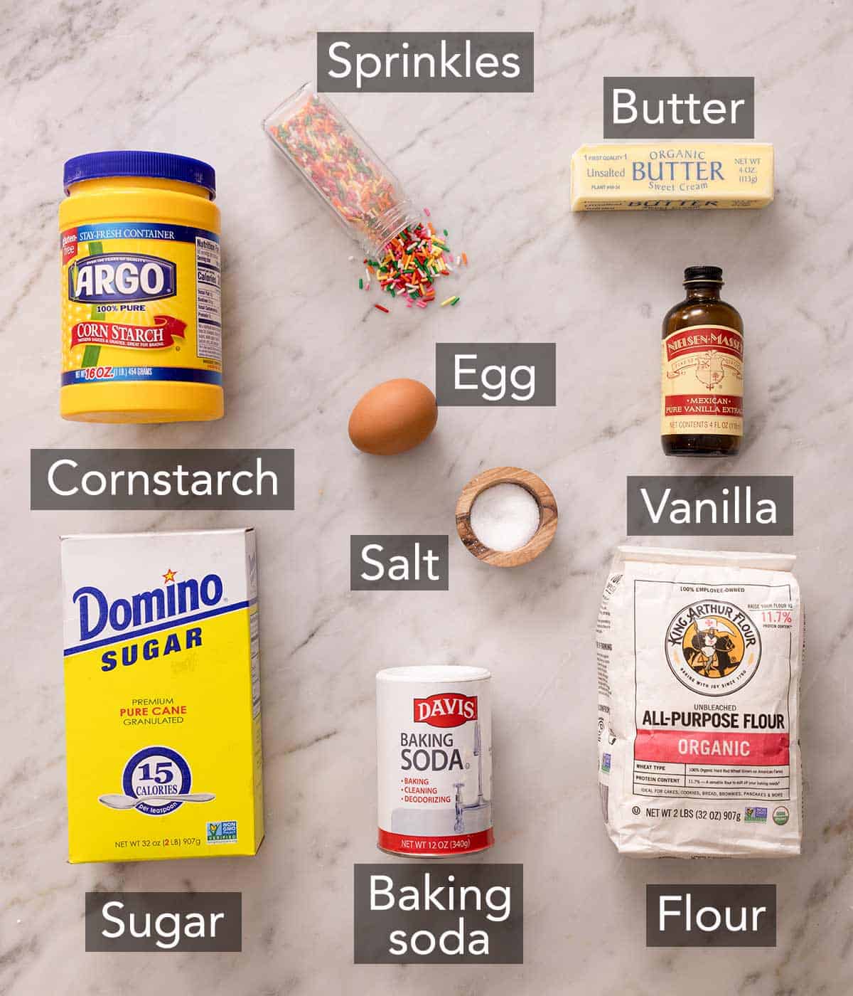 Ingredients needed to make funfetti cookies.