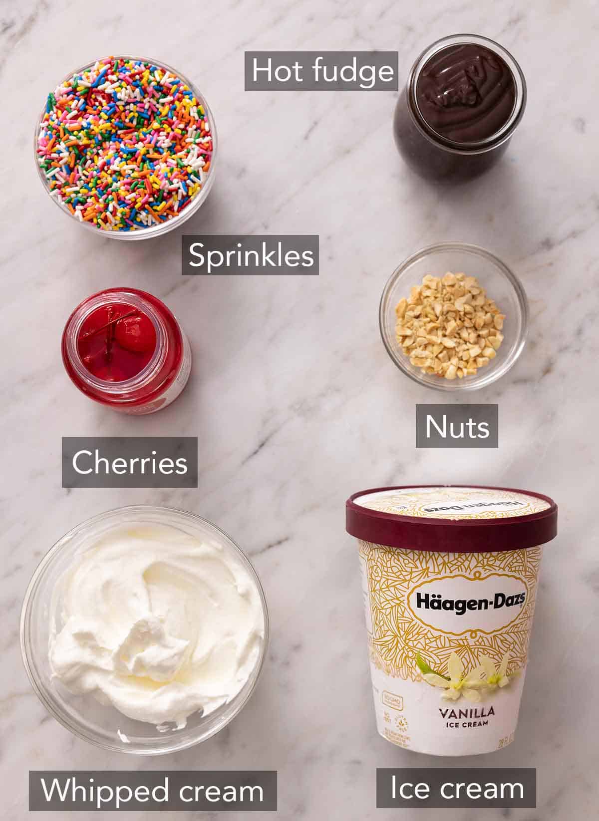 Ingredients needed to make a hot fudge sundae.