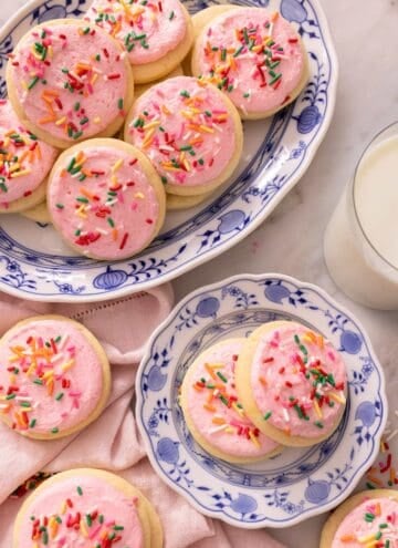 Lofthouse cookies on a small blue plate and a large serving plate
