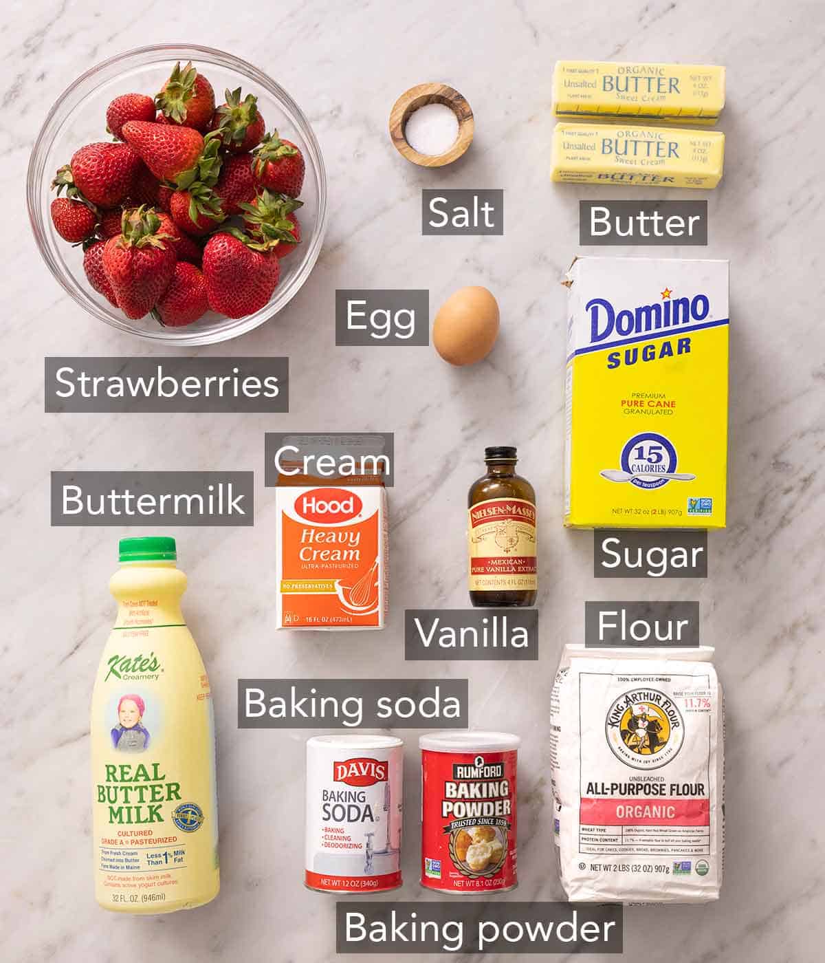 Ingredients needed to make strawberry shortcakes.