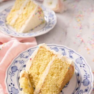 Pinterest graphic of a fork cutting into a slice of vanilla cake.