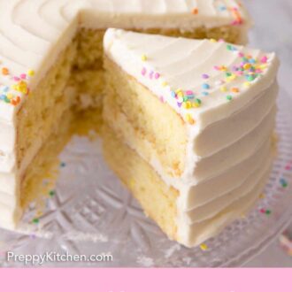 Pinterest graphic of a vanilla cake with a slice cut out and pulled forward.