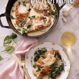 Pinterest graphic of an overhead view of a Staub braiser containing three chicken breasts coated in the florentine sauce beside a plated serving and a glass of wine.