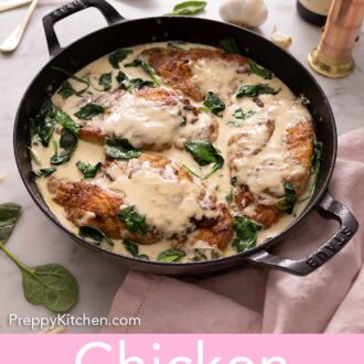 Pinterest graphic of an angled view of a pot of chicken florentine beside a pink linen, a pepper mill, and a bottle of wine.
