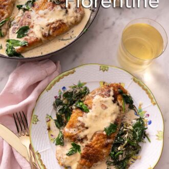 Pinterest graphic of an overhead view of a white and green plate of chicken florentine coated in sauce and spinach.