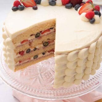 Pinterest graphic of a Chantilly cake with a slice removed.