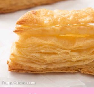 Pinterest graphic of a close up of puff pastry, showing its height and layers.