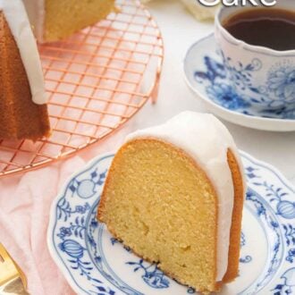 Pinterest graphic of a slice of Bundt cake on a blue and white plate beside a wire rack with the rest of the cake and a cup of coffee.