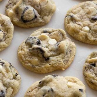 Close up of cookies and cream cookies lined up in 3 rows.