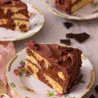 Pinterest graphic of three slices of marble cake with one in focus in the front beside a pink linen napkin.