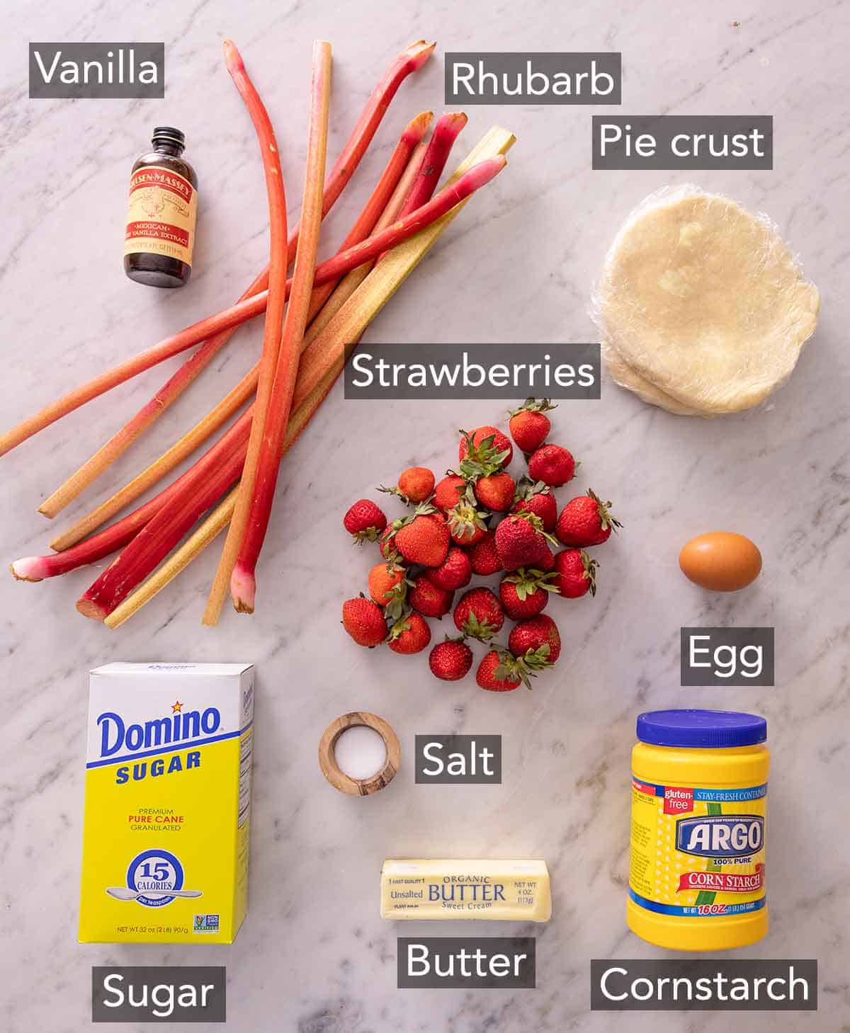 Ingredients needed to make strawberry rhubarb pie.