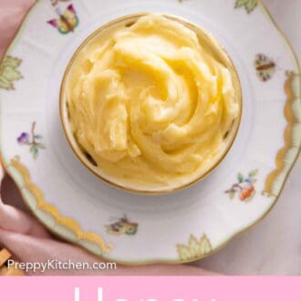 Pinterest graphic of an overhead view of a bowl of honey butter on top of a plate.