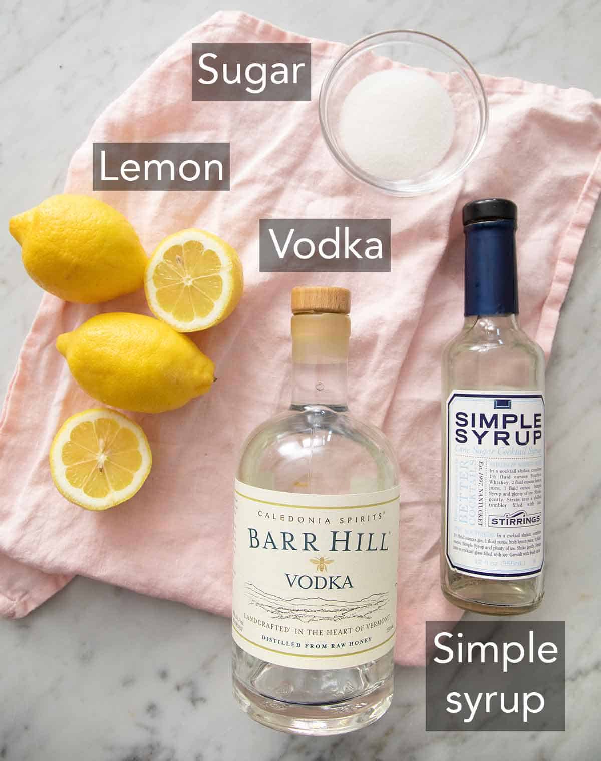Ingredients needed to make a lemon drop martini.
