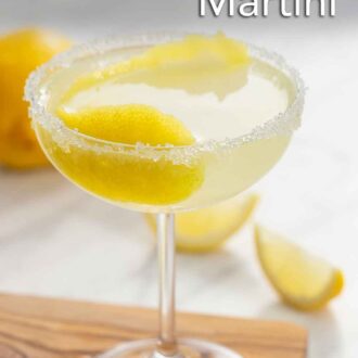 Pinterest graphic of a cocktail glass with sugar on its rim containing a lemon drop martini with a lemon peel as garnish.