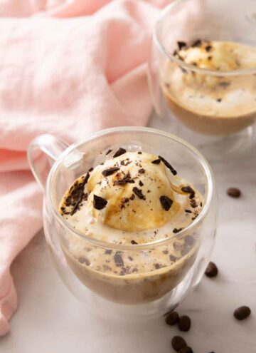 Two glasses of affogato with one in front of the other.