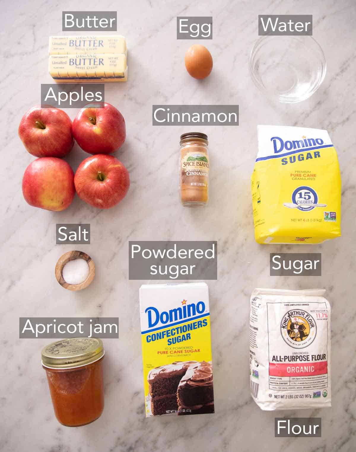 Ingredients needed for an apple tart.