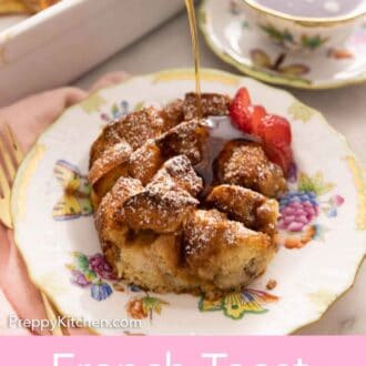 Pinterest graphic of a serving of French toast casserole on a plate with maple syrup poured over.