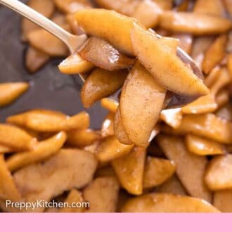 Pinterest graphic of a spoonful of fried apples lifted from the cast iron skillet.