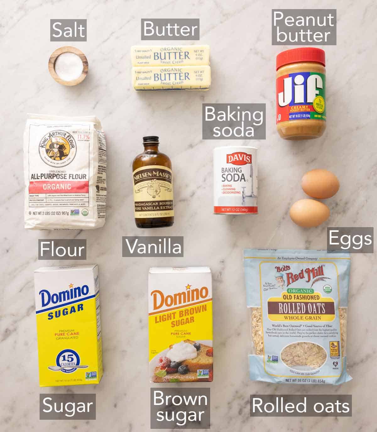 Ingredients needed to make peanut butter oatmeal cookies.