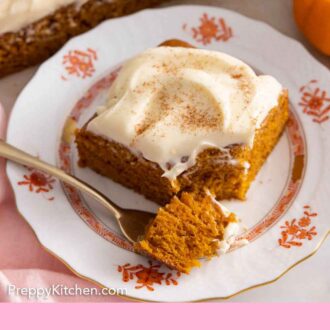 Pinterest graphic of a plate with a square slice of pumpkin cake with a fork in front, with a piece on it.