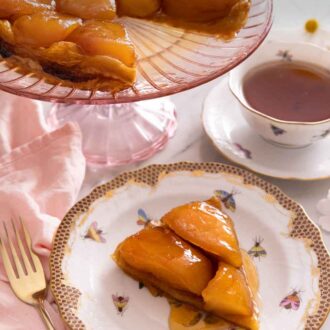 Pinterest graphic of a slice of tarte Tatin on a plate in front of a pink serving platter with the rest of the Tatin.