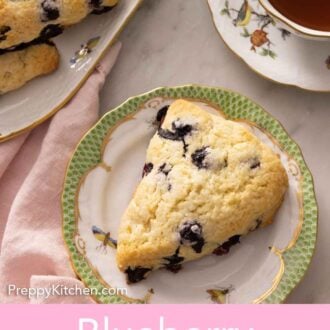 Pinterest graphic of a plate with a blueberry scone in front of a cup of tea.