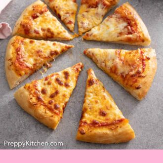 Pinterest graphic of a cut cheese pizza with a slice pulled forward.