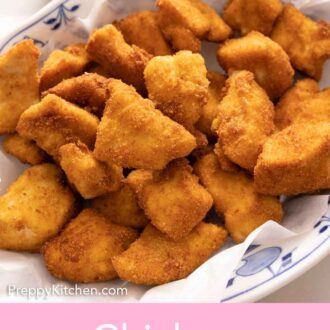Pinterest graphic of a plate of chicken nuggets.