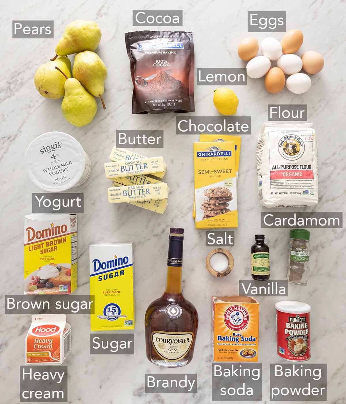Ingredients needed to make a chocolate pear cake.