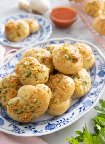 A plate with multiple garlic knots.