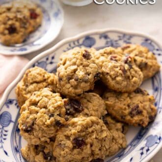 Pinterest graphic of a platter of oatmeal cranberry cookies.