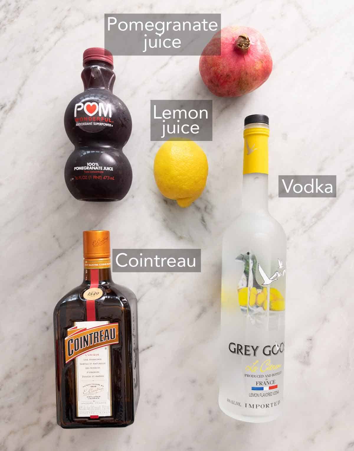 Ingredients needed to make a pomegranate martini.