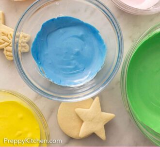 Pinterest graphic of bowls of colorful royal icing.