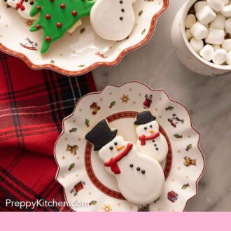 Pinterest graphic of an overhead view of multiple cookies decorated with royal icing.
