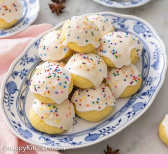 Pinterest graphic of a platter of anise cookies.