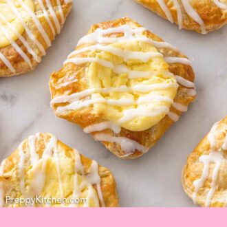 Pinterest graphic of multiple cheese danishes with a glaze on top.