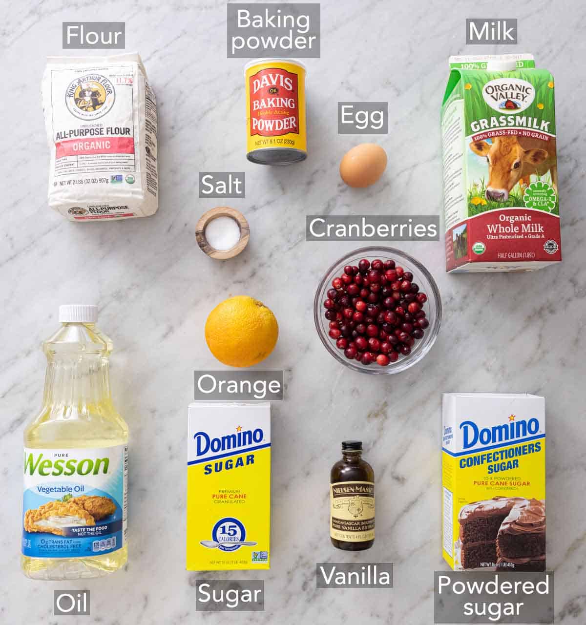 Ingredients needed to make cranberry orange bread.