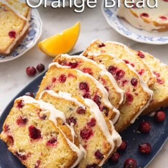 Pinterest graphic of a platter with sliced cranberry orange bread.