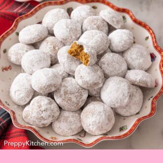 Pinterest graphic of a platter with a pile of Pfeffernusse cookies.