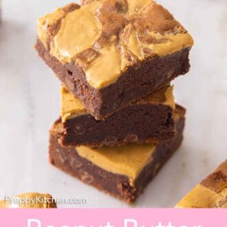 Pinterest graphic of a stack of three peanut butter brownies.