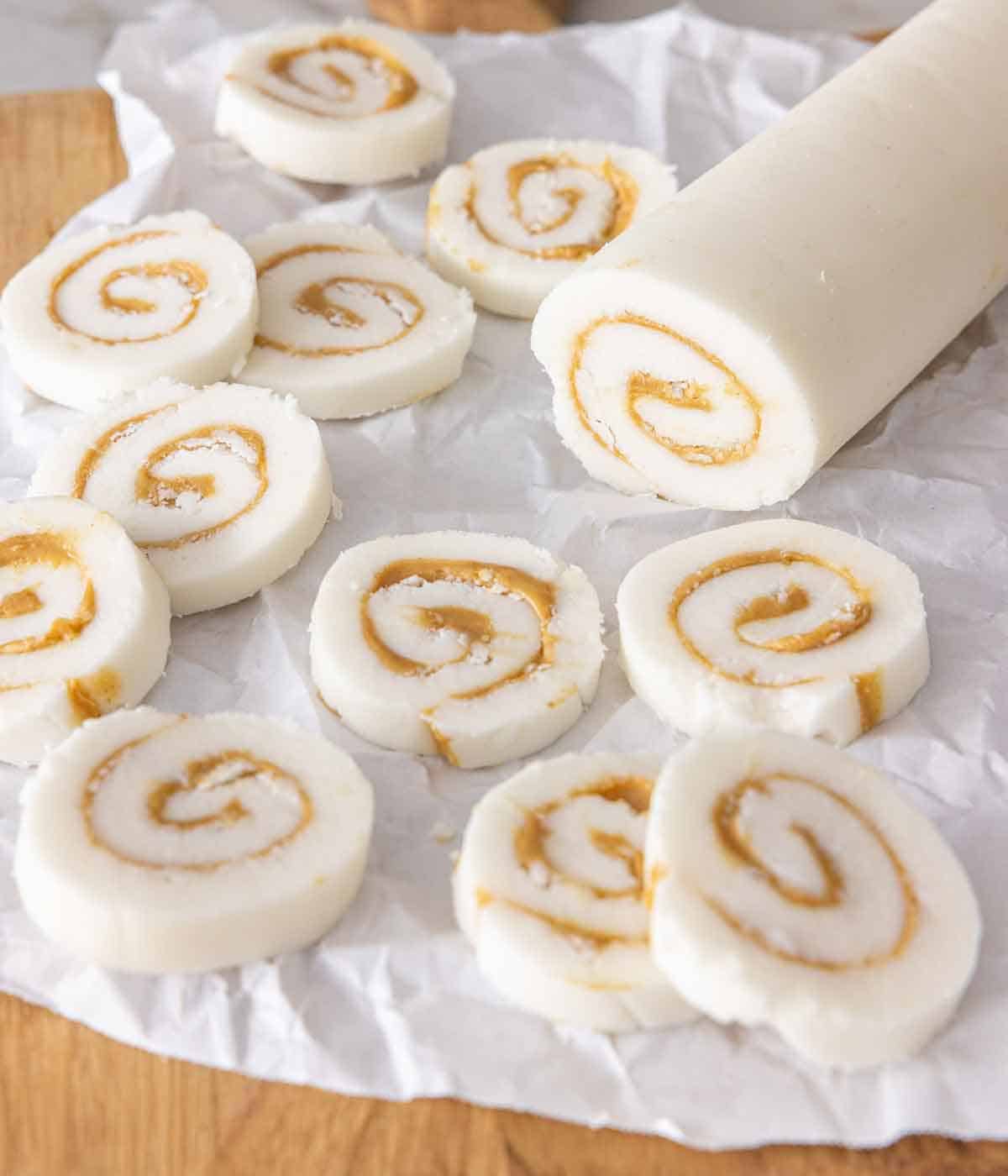 A log of potato candy with slices surrounding it.