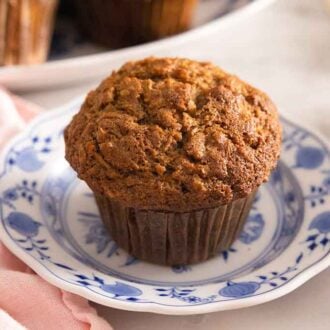 A small plate with a morning glory muffin.