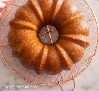 Pinterest graphic of an overhead view of a butter cake on a cooling rack.