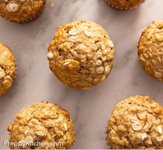 Pinterest graphic of an overhead view of multiple oatmeal muffins.