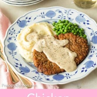 Pinterest graphic of a plate with chicken fried steak, gravy, mashed potatoes, and peas.