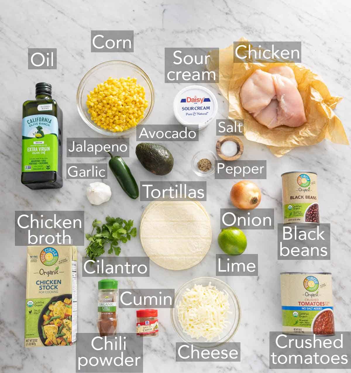Ingredients needed to make chicken tortilla soup.