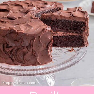 Pinterest graphic of a devil's food cake on a cake stand with a slice cut and pulled out.