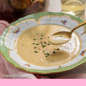 Pinterest graphic of a spoonful of vichyssoise lifted from a bowl.