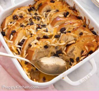Pinterest graphic of a baking dish of capirotada with a spoonful scooped out.