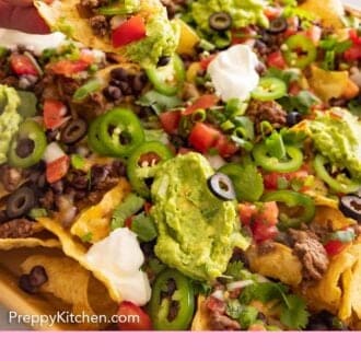 Pinterest graphic of a tortilla chip lifted from a sheet pan of nachos.